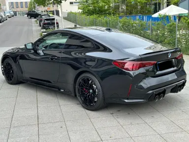 bmw m4 competition 2024 side view